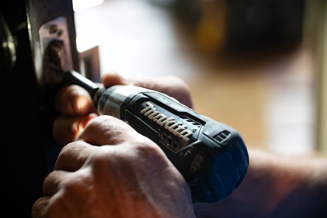 A person doing repairs