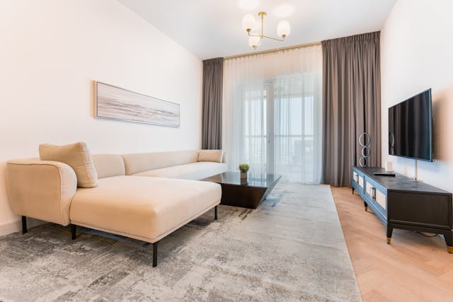 cozy-living-room-with-a-comfortable-couch-a-stylish-chair-and-a-sleek-television