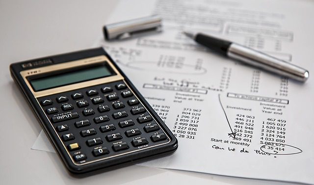 calculator-with-paperwork