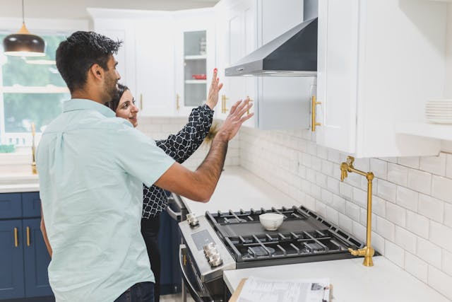 two-people-looking-at-a-house-kitchen